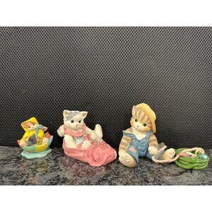 Set Of 3 Ceramic Cat Figurines In Raincoat & Bag With Playful Accessories